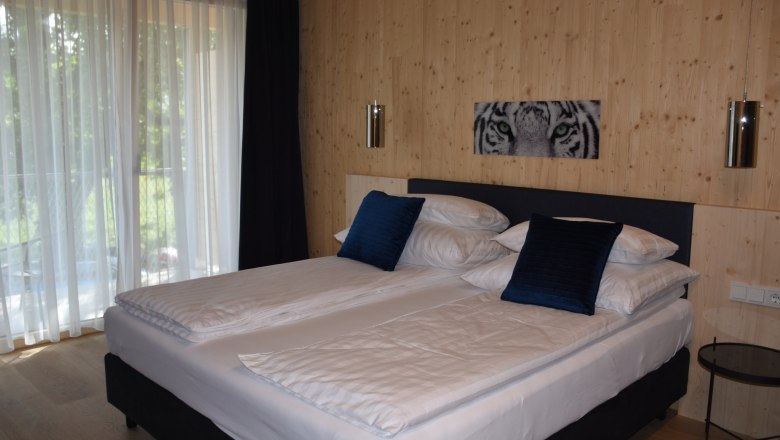 doppelbett-themenzimmer-tiger, © Helmut Leonhartsberger doppelbett-themenzimmer-tiger, © Helmut Leonhartsberger